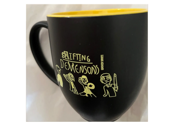 Black mug with yellow centre with yellow outline picture of characters from Shifting Dimensions