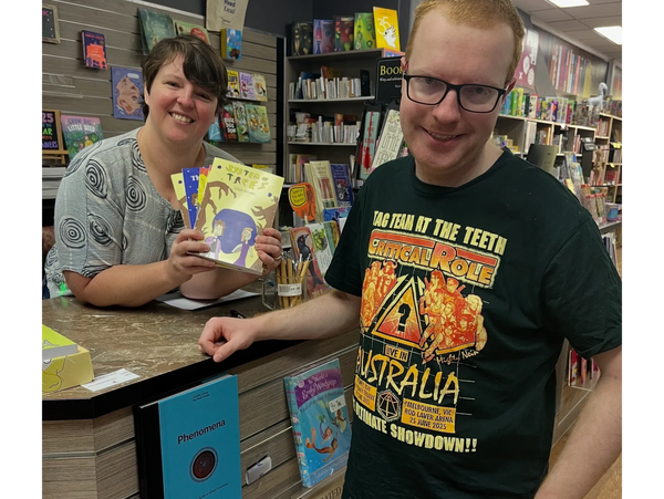 Liam at the Bookshop Darwin with Ashleigh the Manger