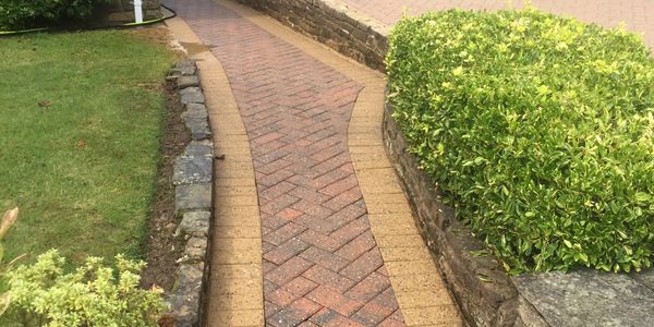 Sidewalk cleaned from gutter