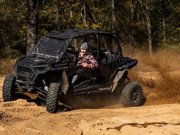 Driving Polaris RZR 1000 4-Seater 