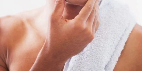 a man having clean shave 