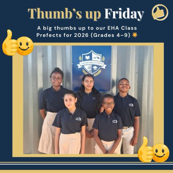 EHA Class Prefects for 2026 posing together with smiles and thumbs up.