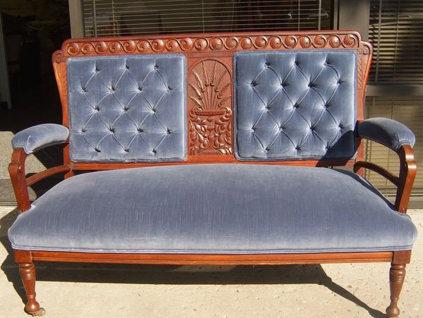 Restored and upholstered antique settee bench.