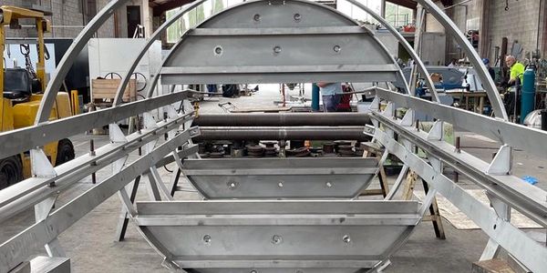 Temporary works for storm water baffle plates