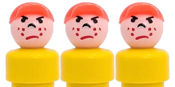 Three toy figures with angry expressions and red hats.