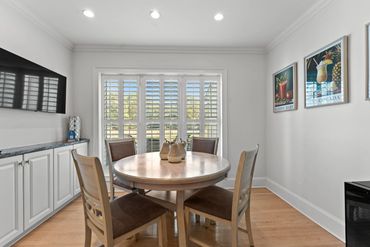 eat in kitchen with plantation shutters, coffe ebar and lagoon view