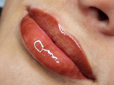 Fresh lip blush treatment with lip shine showing high color definition 