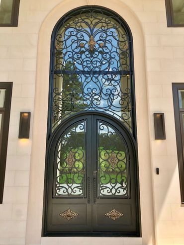 Custom metal front door from a luxury home build by Alex The Builder in Atlanta, Georgia