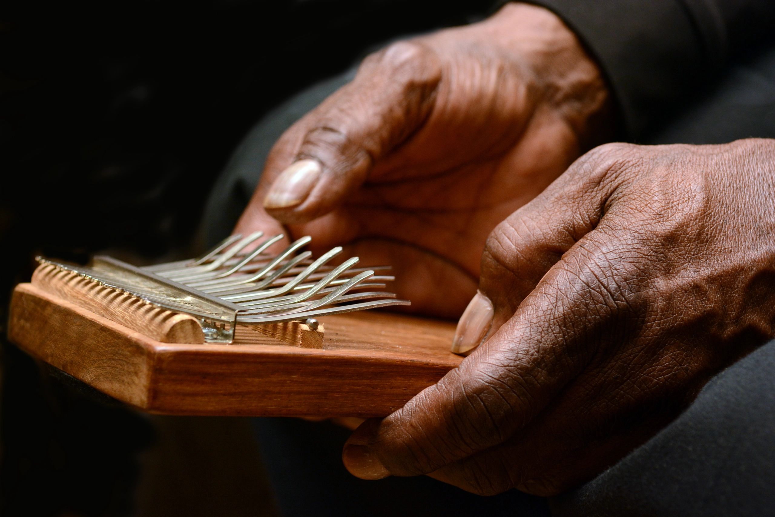 DR. ALBERT GUNN PLAYING KALIMBA
