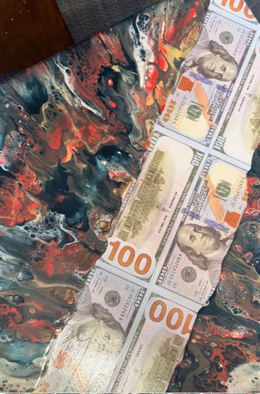 Acrylic paint with artificial money on canvas
