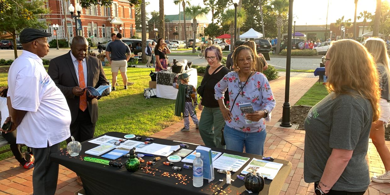 EJAB Board Members Commissioner Allen Booker (left) and Dr. Kimberly Andrews (right) at Brunswick Fi