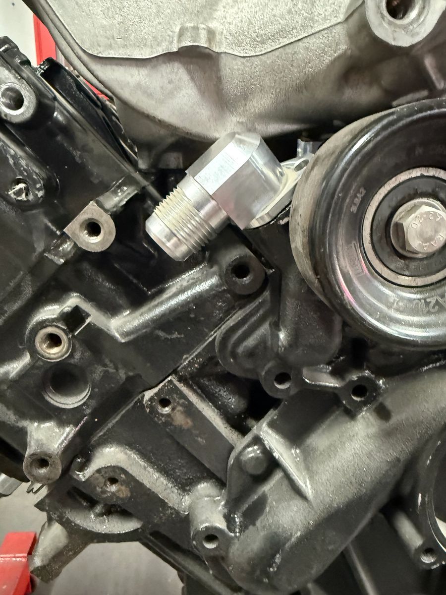 FRONT COVER TO HEATER CORE -12 FITTING