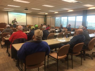 FCNWCB Field Inspector Marc Miller presents a calibration video to applicators at a training event.