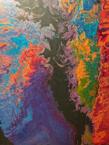 colorful acrylic painting with reds, blues, purple, green and  orange