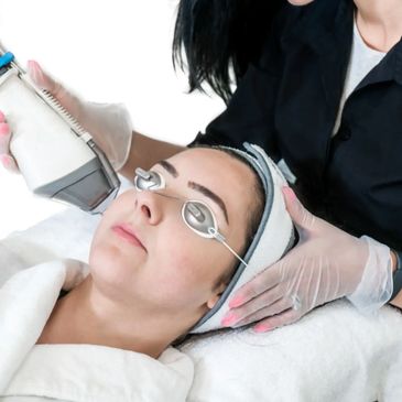 Woman having IPL dry eye treatment