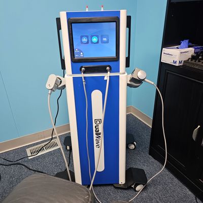 DualWave medical device with screen and handheld applicators.