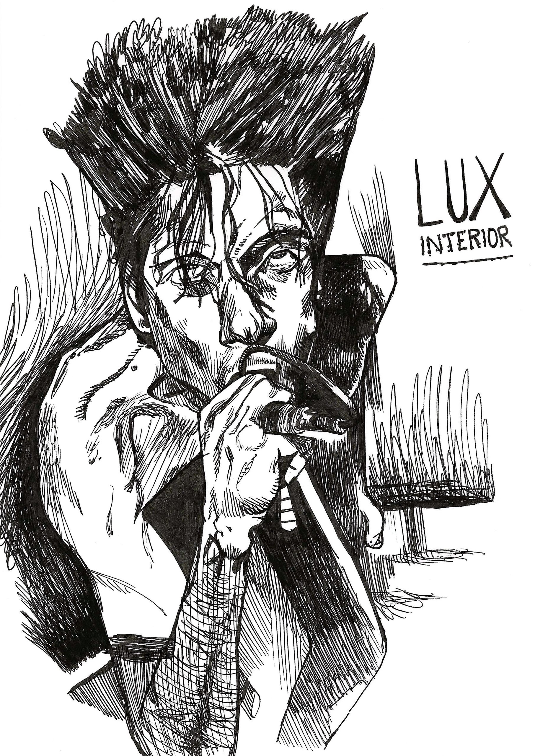 Lux Interior from The Cramps sucking on a microphone.