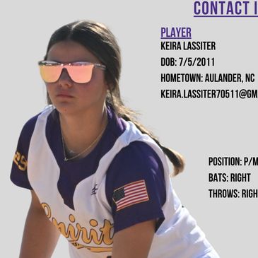 Female softball player in Spirit uniform with sunglasses focused on the game.