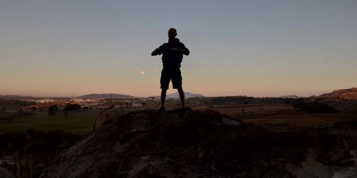 Fernando Echeveste founder of ReikiJunction.com practicing Qigong in the mountains