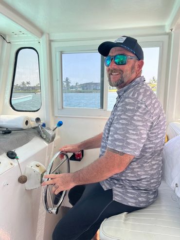 Captain Mike doing what he loves most!