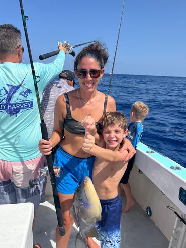 This little boy caught the first fish of the day with his mom, great memories!