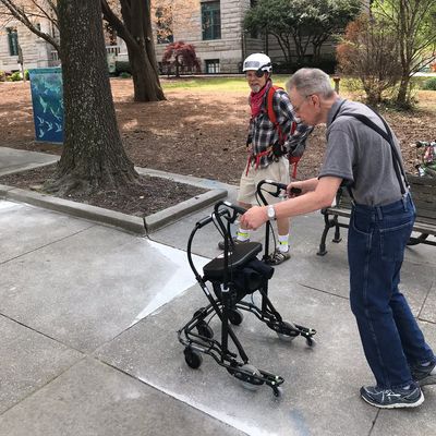 Man with walker easily navigates sidewalks repaired by Georgia Safe Sidewalks
