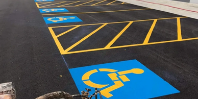 ADA Marking blue and yellow. Parking lot stencils, Handicap marking.