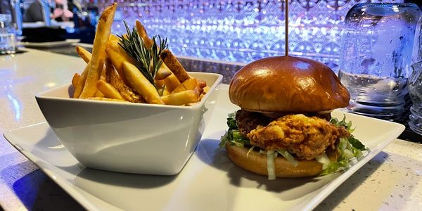 Crispy chicken sandwich and french fries at Copper Bar Kitchen & Microbrewery in SF Castro District