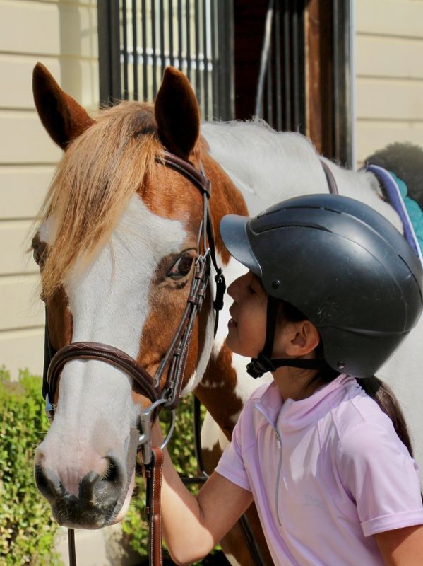 timid rider gaining confidence with her pony