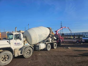 Concrete delivery to a jobsite with ap pump