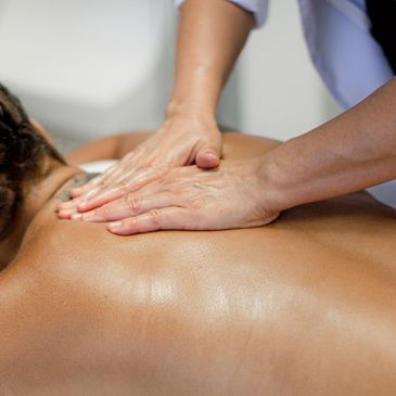 Close Up of a Med Spa Professional Doing Deep Tissue Massage to a Man