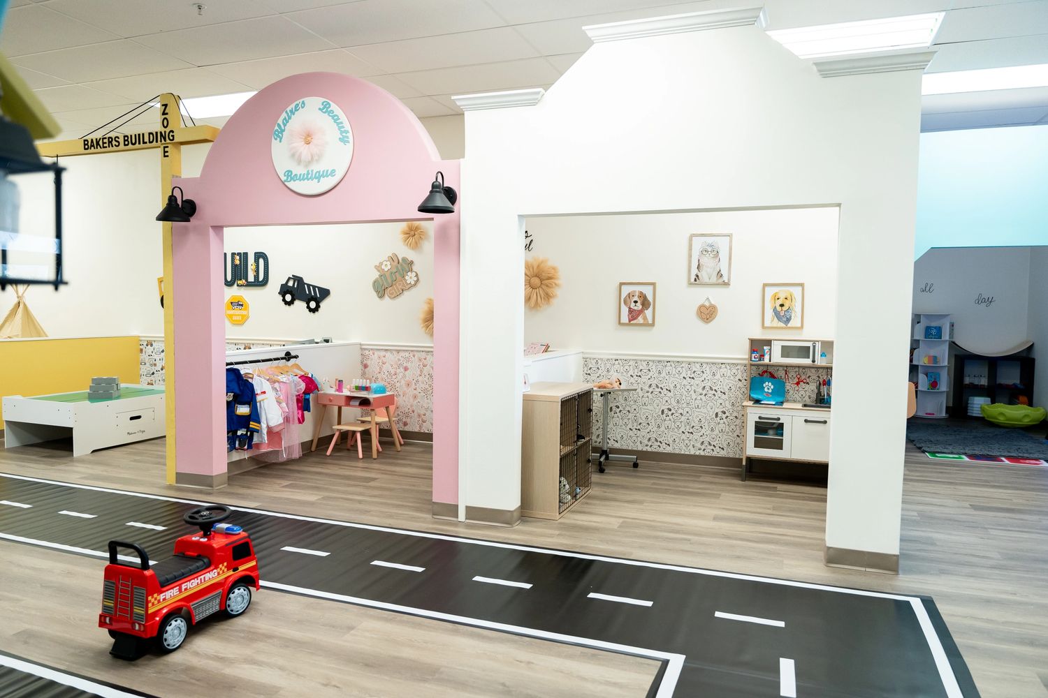 Indoor playground featuring imaginative play such as pretend play vet, boutique and sensory room