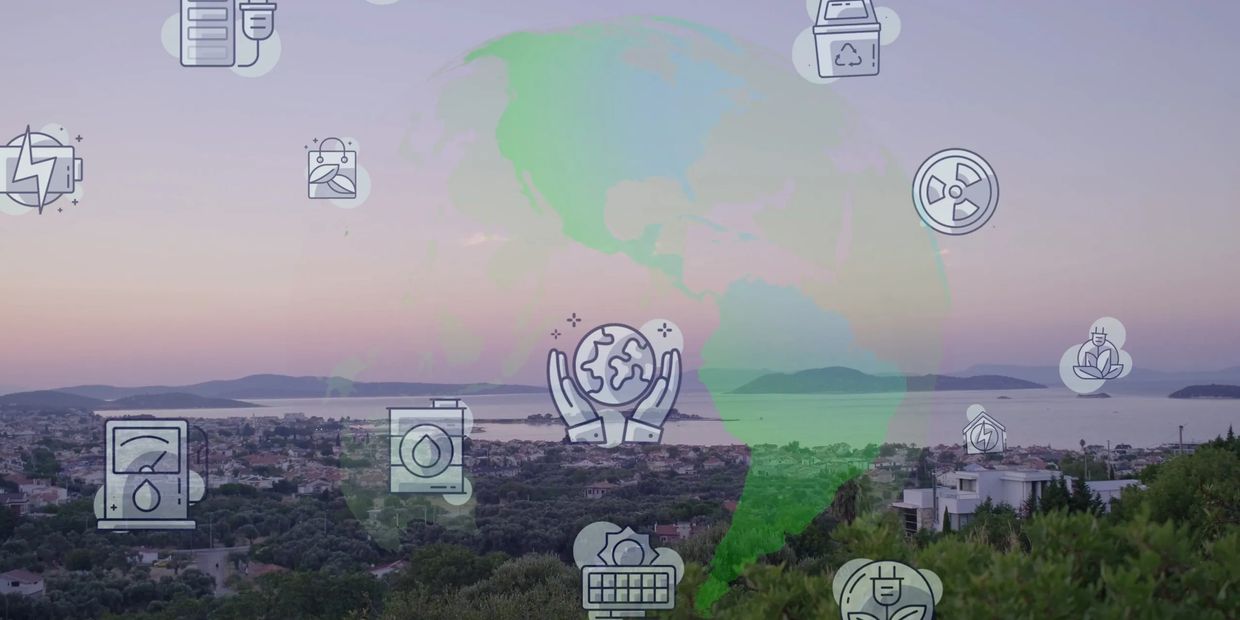 Sunset cityscape with environmental and energy icons overlaid on a transparent globe.