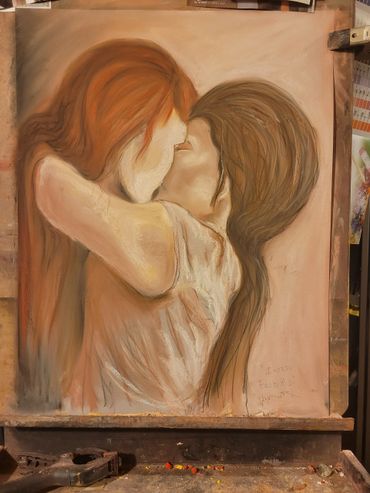Painting of two women tenderly embracing and kissing.