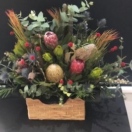 native floral arrangement against black background
