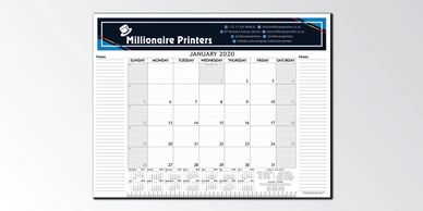 Desk planners can be can be custom printed and used as marketing material and gifts.
