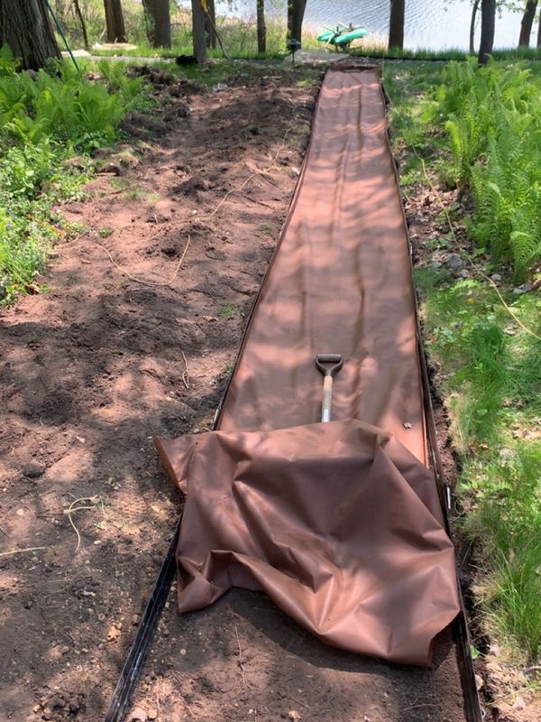 Stone walkway and gravel path by HammerTime Landscaping LLC in Stillwater, MN.