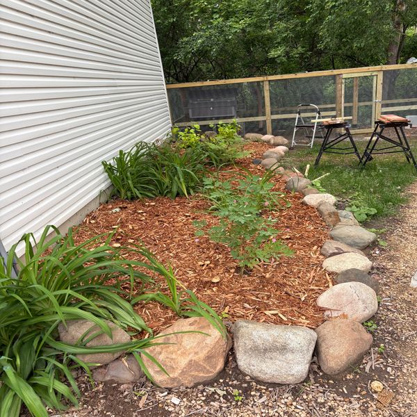 Mulch install by HammerTime Landscaping in Stillwater.