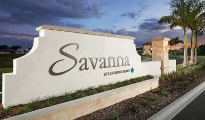 Entrance sign for Savanna at Lakewood Ranch community during dusk.