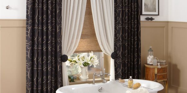 Draperies, quality and affordable window treatments, over a bathroom in Panama City Florida