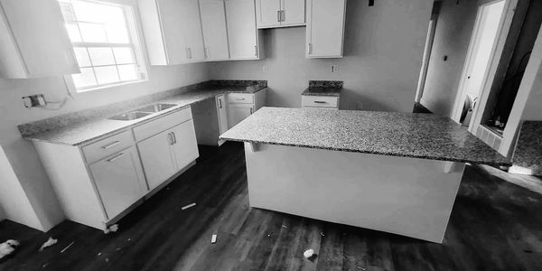 Full Kitchen remodel with new flooring new cabinetry new granite counter tops