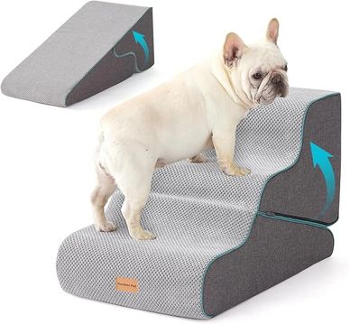 Dog climbing soft pet stairs.