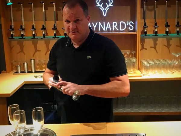 Barman setting Glasses up For Mobile event hire bar in Essex,  all Events weddings anniversaries 
