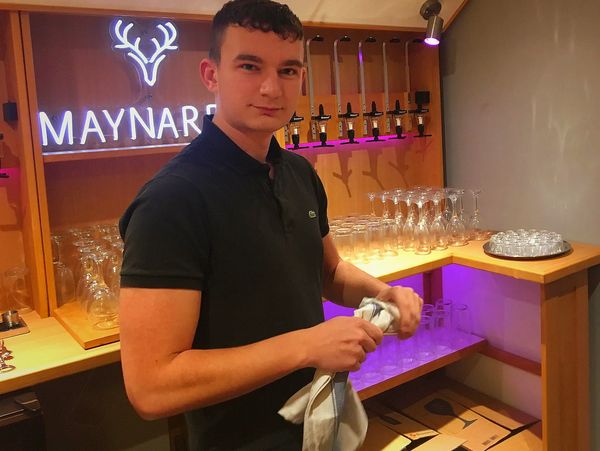  barman  behind mobile event Hire bar, setting up for Birthday party in Essex,  best mobile bar  