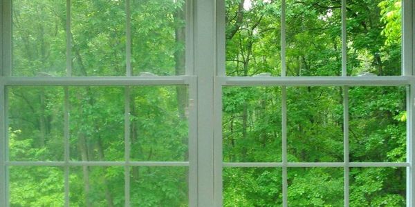 Before and after exterior and interior window cleaning service. 