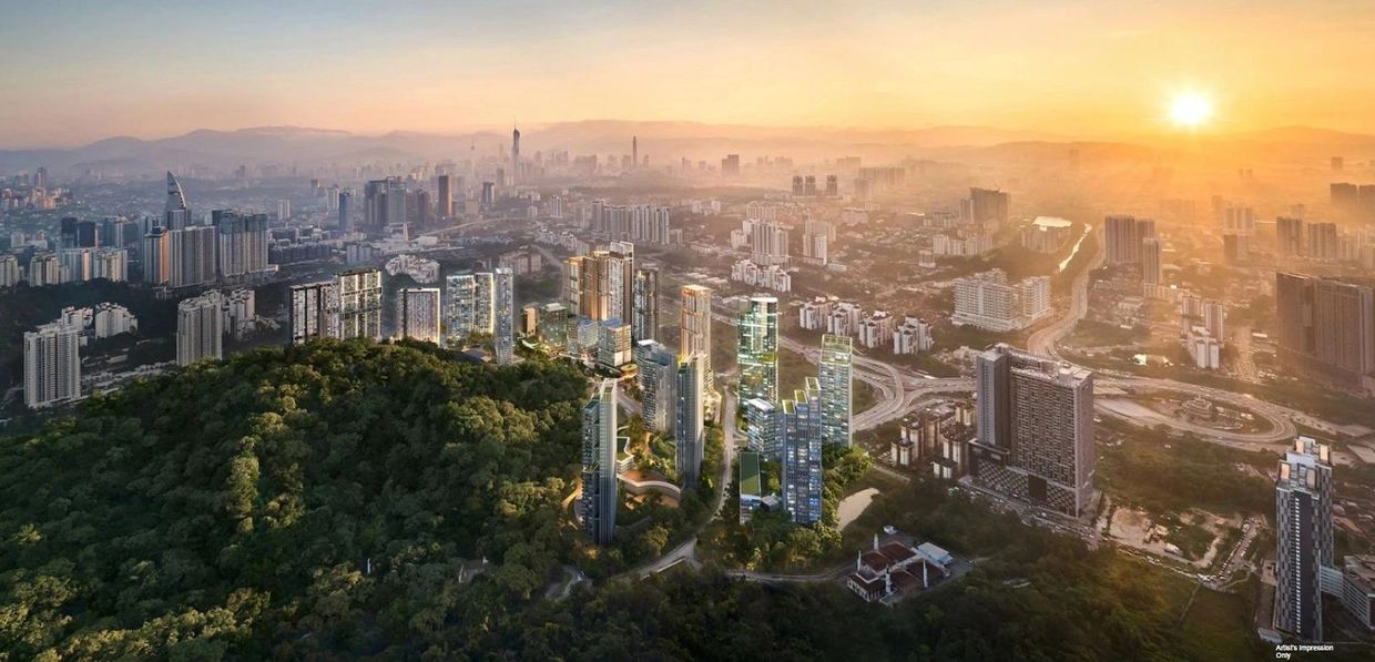 Modern cityscape with green hills and high-rise buildings.