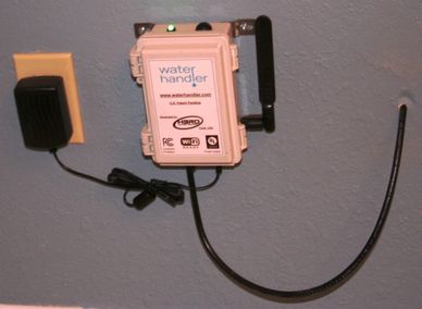 Water Handler device mounted on a wall.