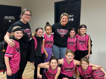 Post game huddle after a big overtime win in the MEYBL league!