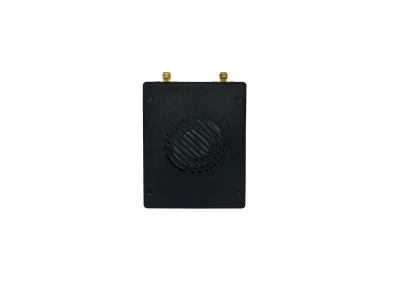 Black rectangular device with a circular vent and two connectors on top.
