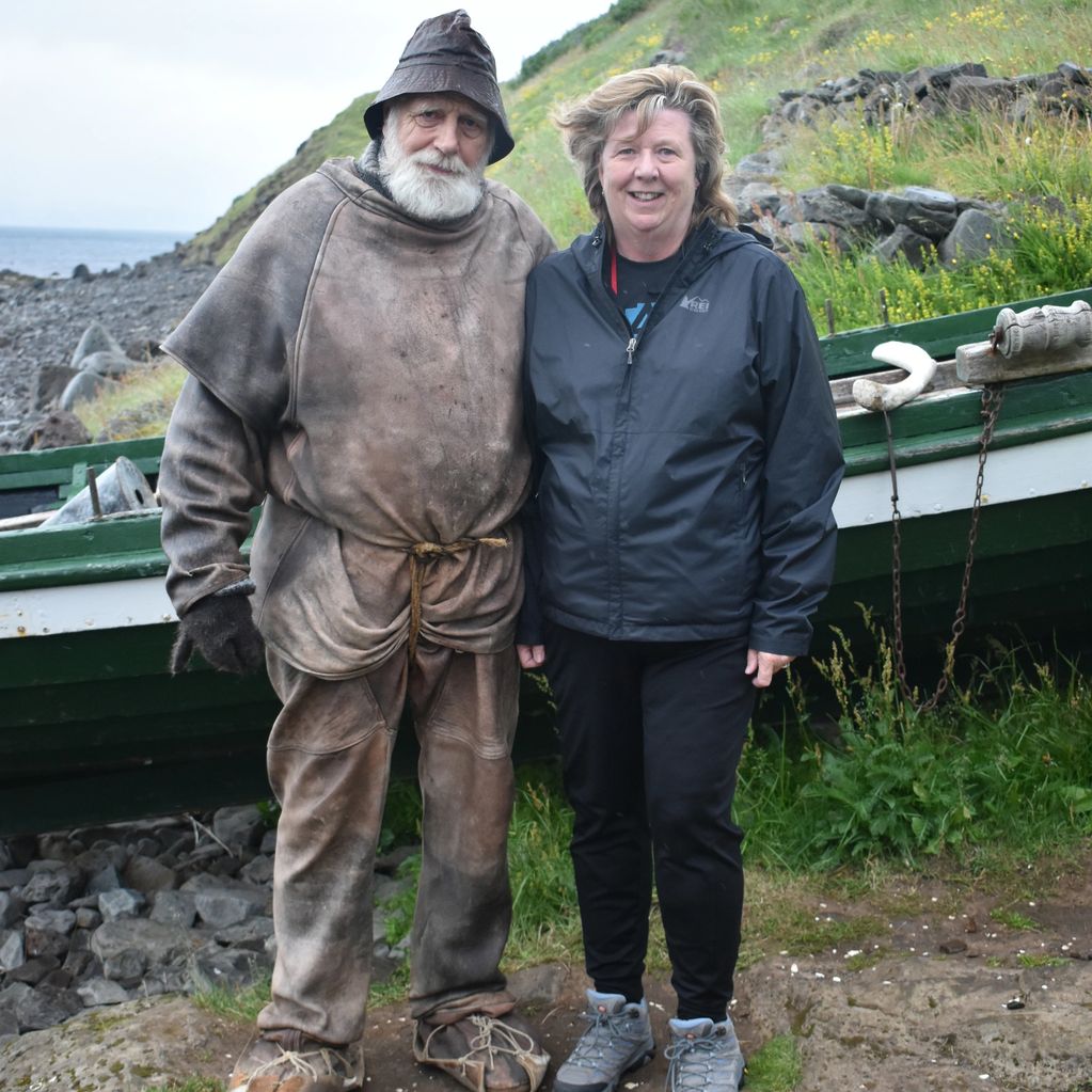 7/19 - Marcie's new friend.  A local fishermen dressed up in a traditional sheepskin "wet suite" 